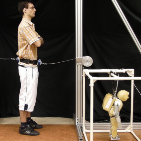Humanoid robot posture-control learning in real-time based on human sensorimotor learning ability